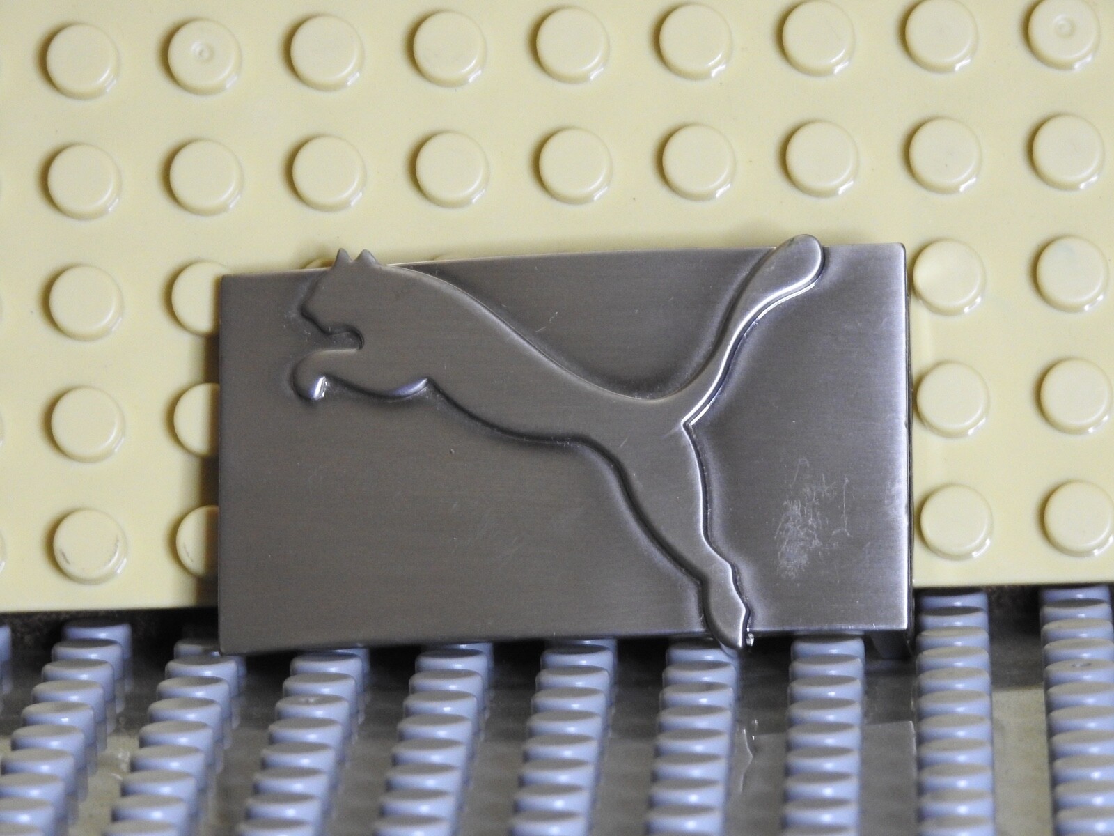 Puma belt buckle