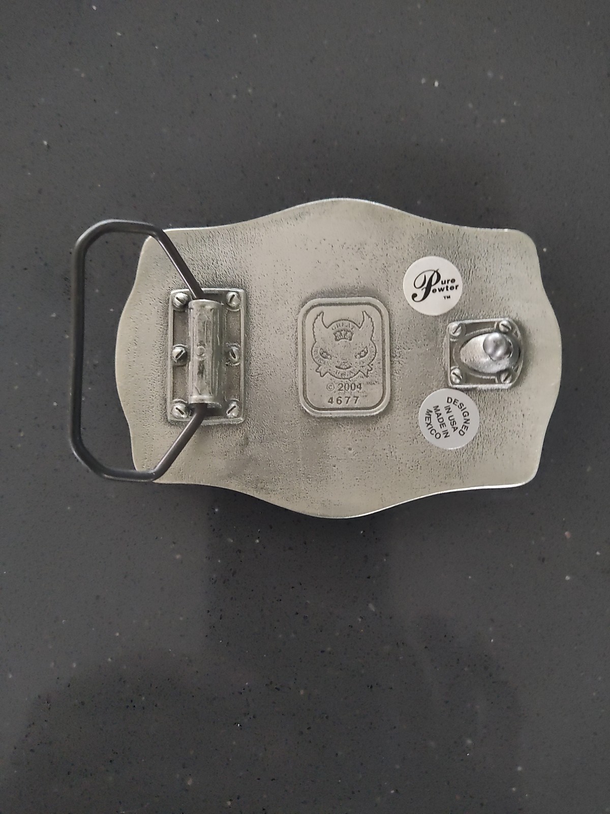New Belt Buckle Featuring a Surfer