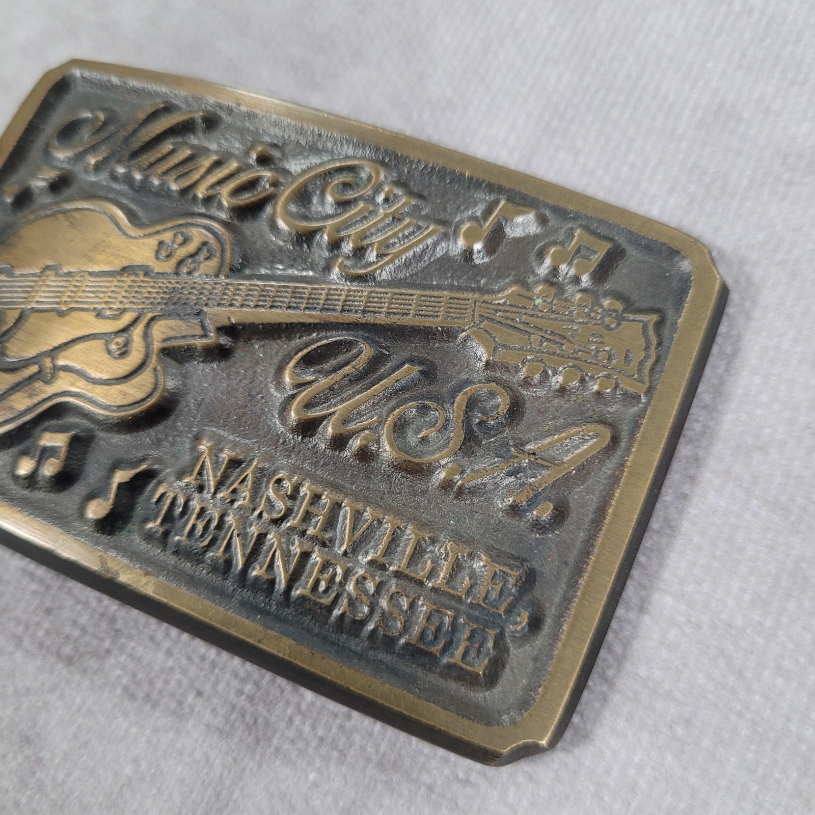 VTG Nashville Belt Buckle Music City Tennessee Guitar Brass Tone Souvenir U.S.A.