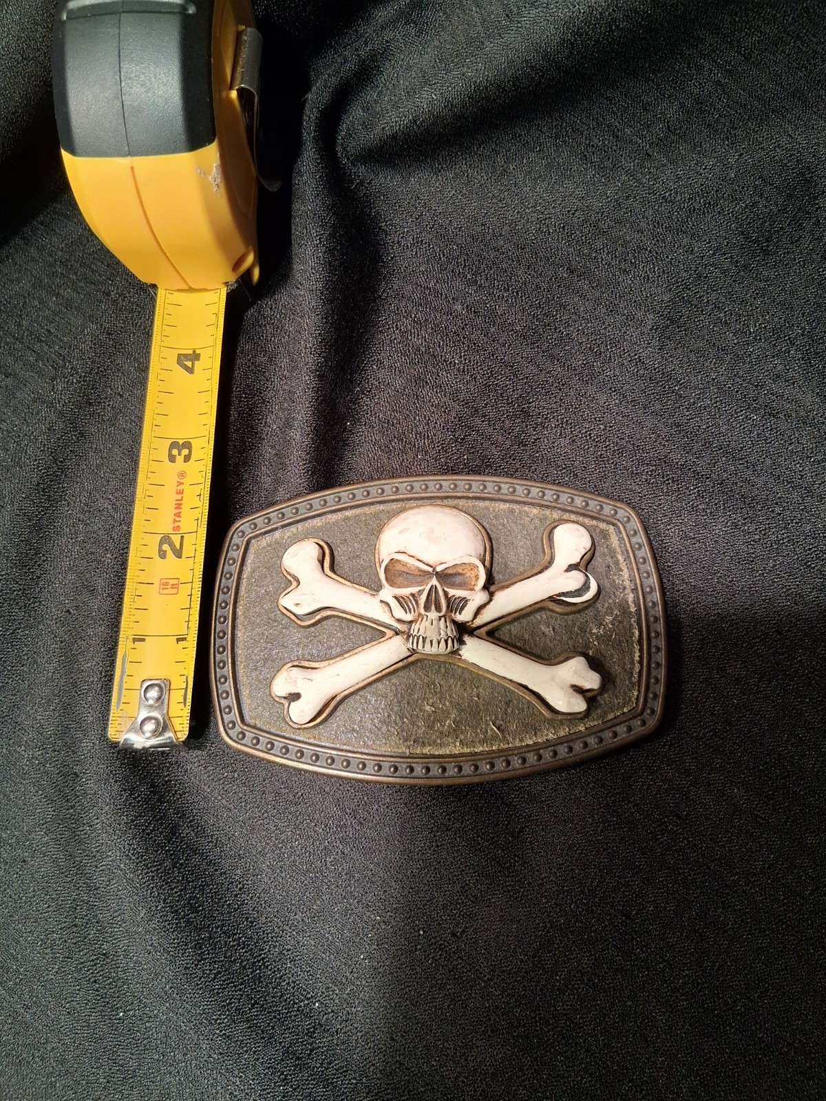 SKULL & CROSSBONES JOLLY ROGER BELT BUCKLE W/ RAISED SKULL & BONES 41/2 BY 3 IN