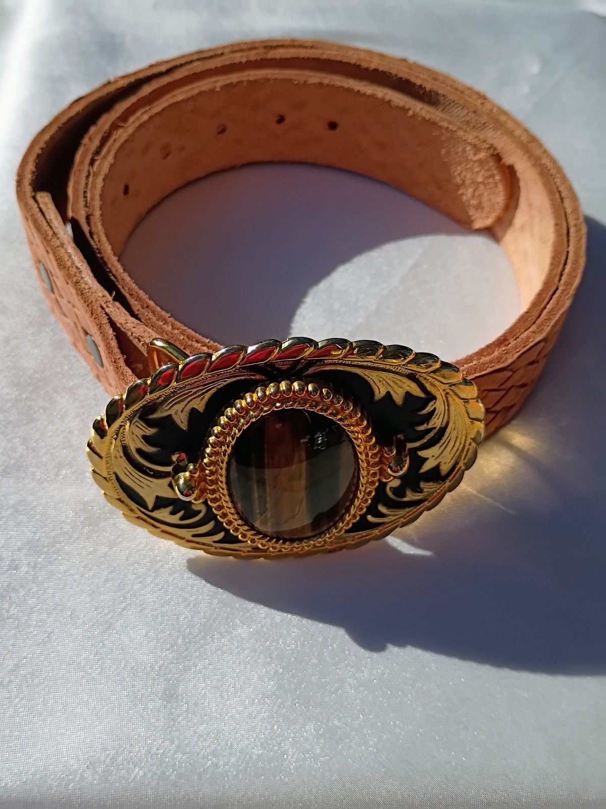Tooled leather belt with western gold toned buckle w/tiger eye embellishment