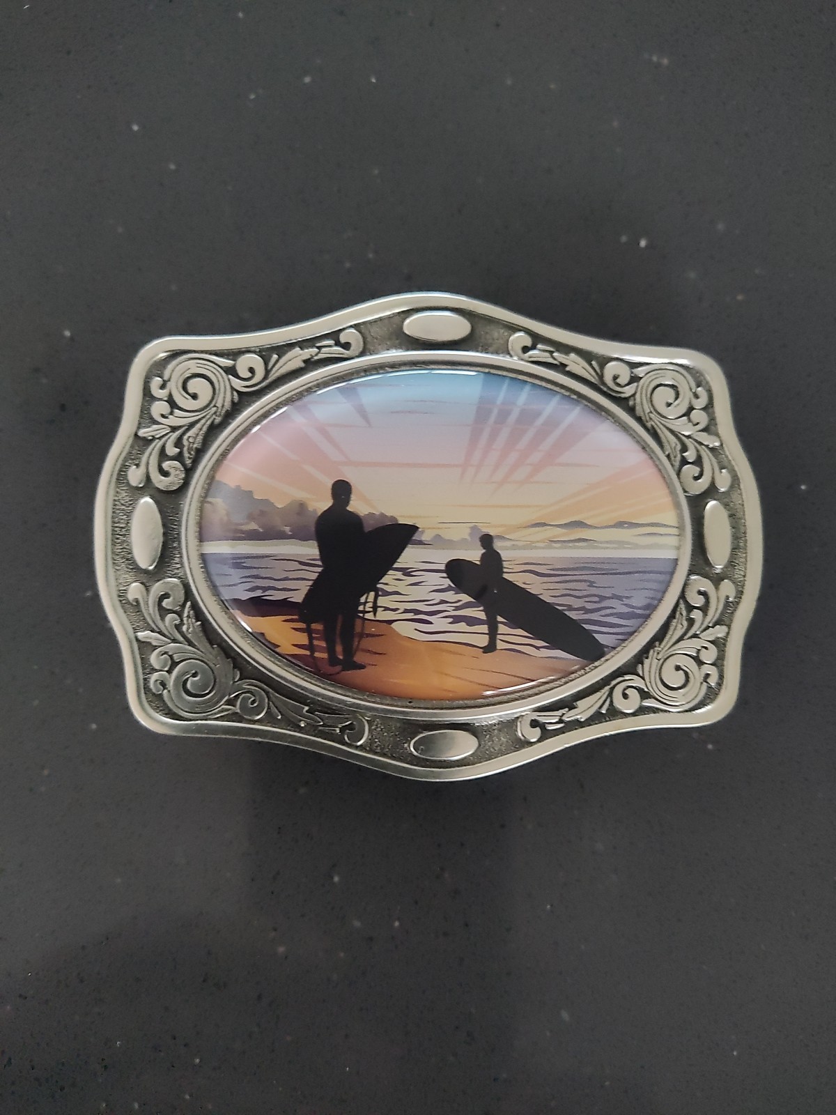 New Belt Buckle Featuring a Surfer