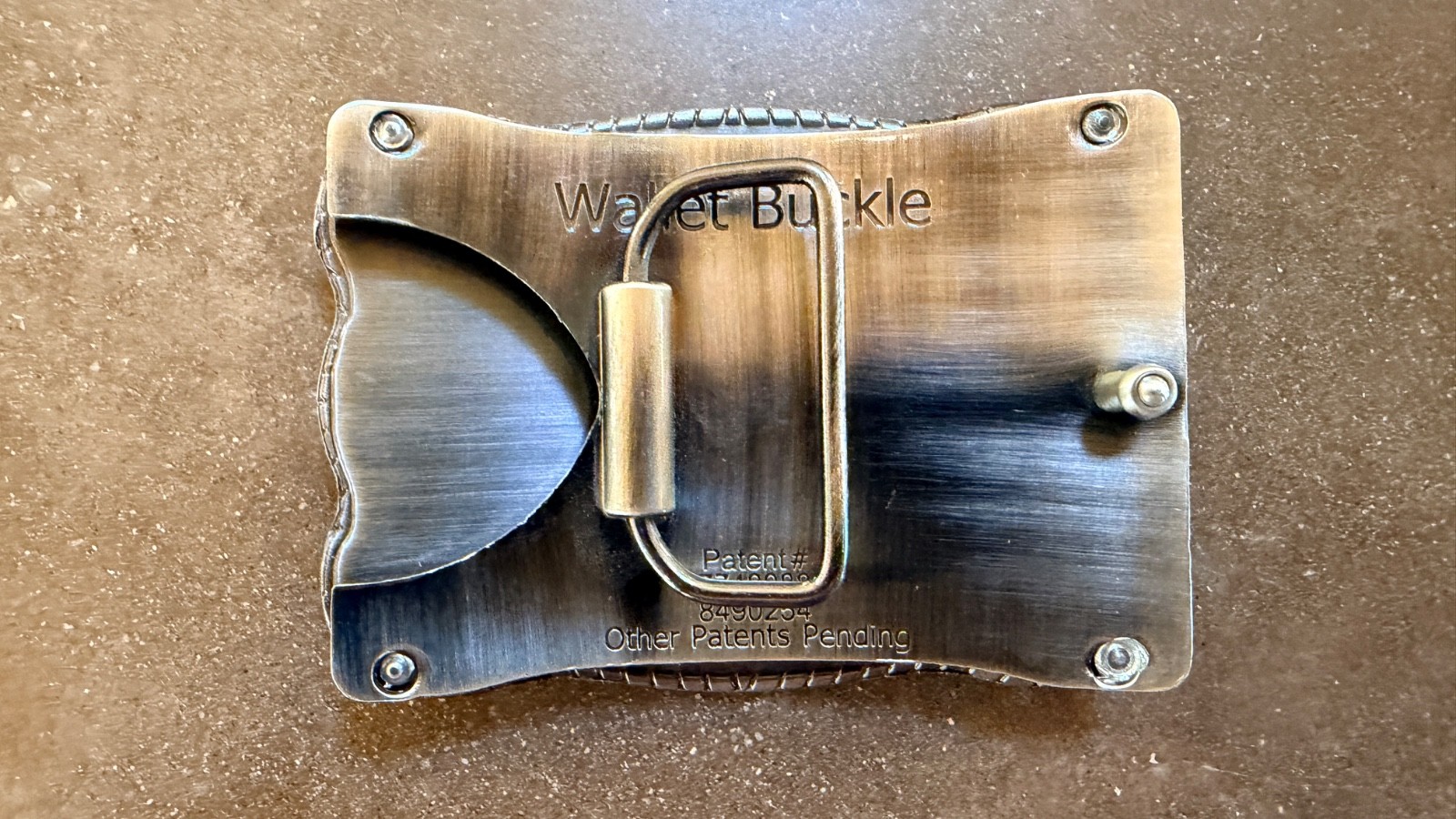 BUCKLE WALLET. TAN OSTRICH HIDE. TITANIUM ROPE EDGING.HOLDS ID, CREDIT CARDS, $.