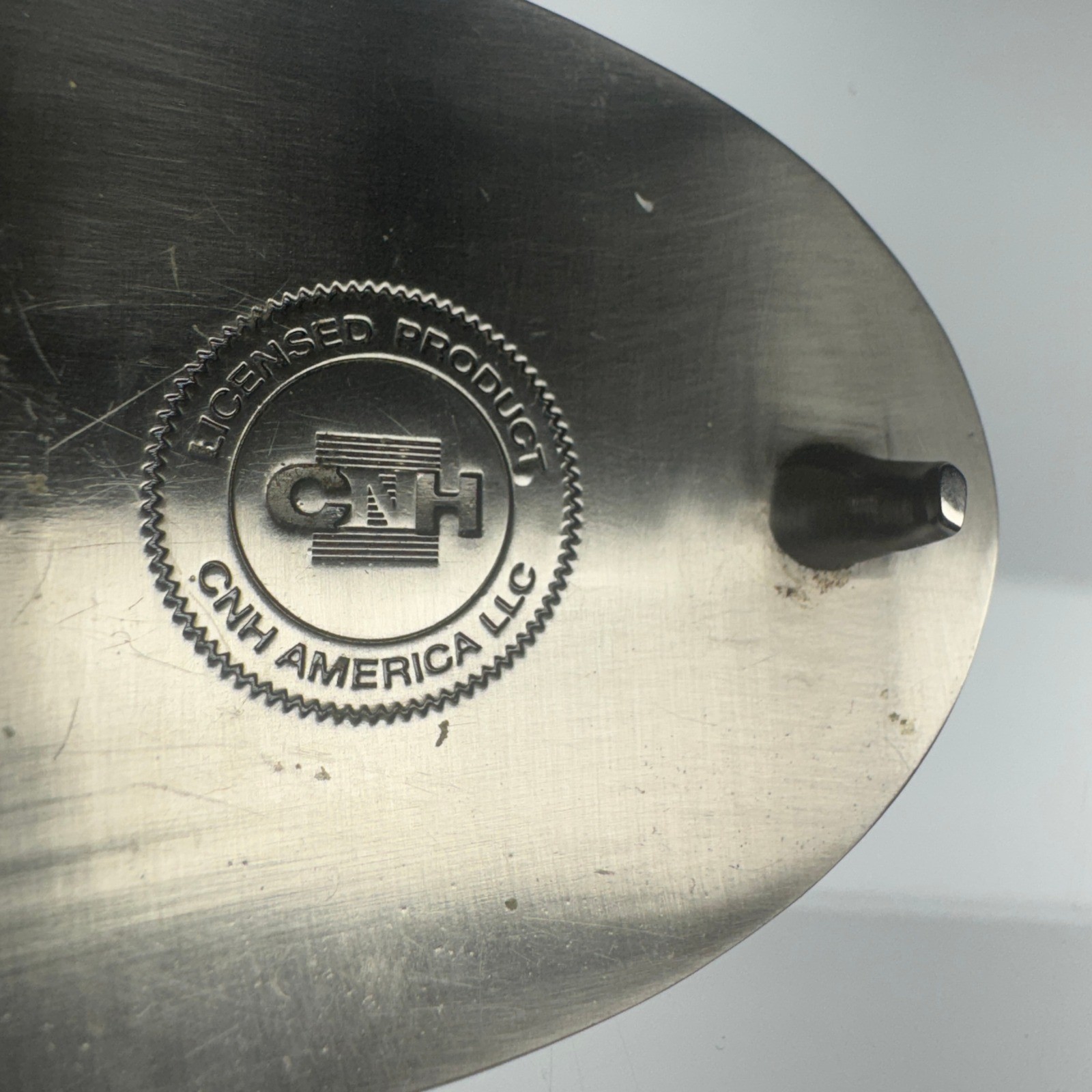 CASE IH Licensed Product Oval Belt Buckle Black Silver Tone CNH America LLC