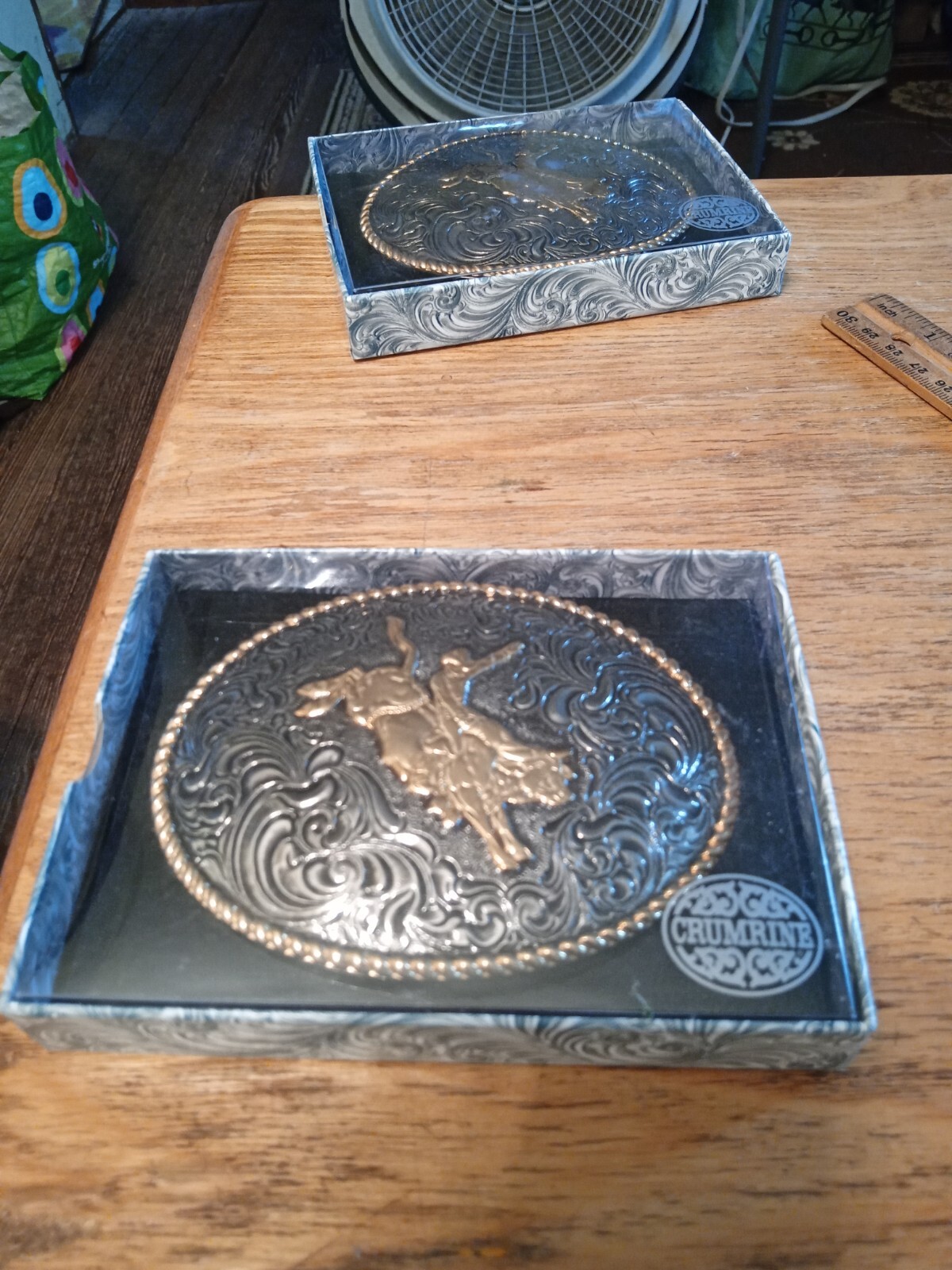New crumrine belt buckle bull riding