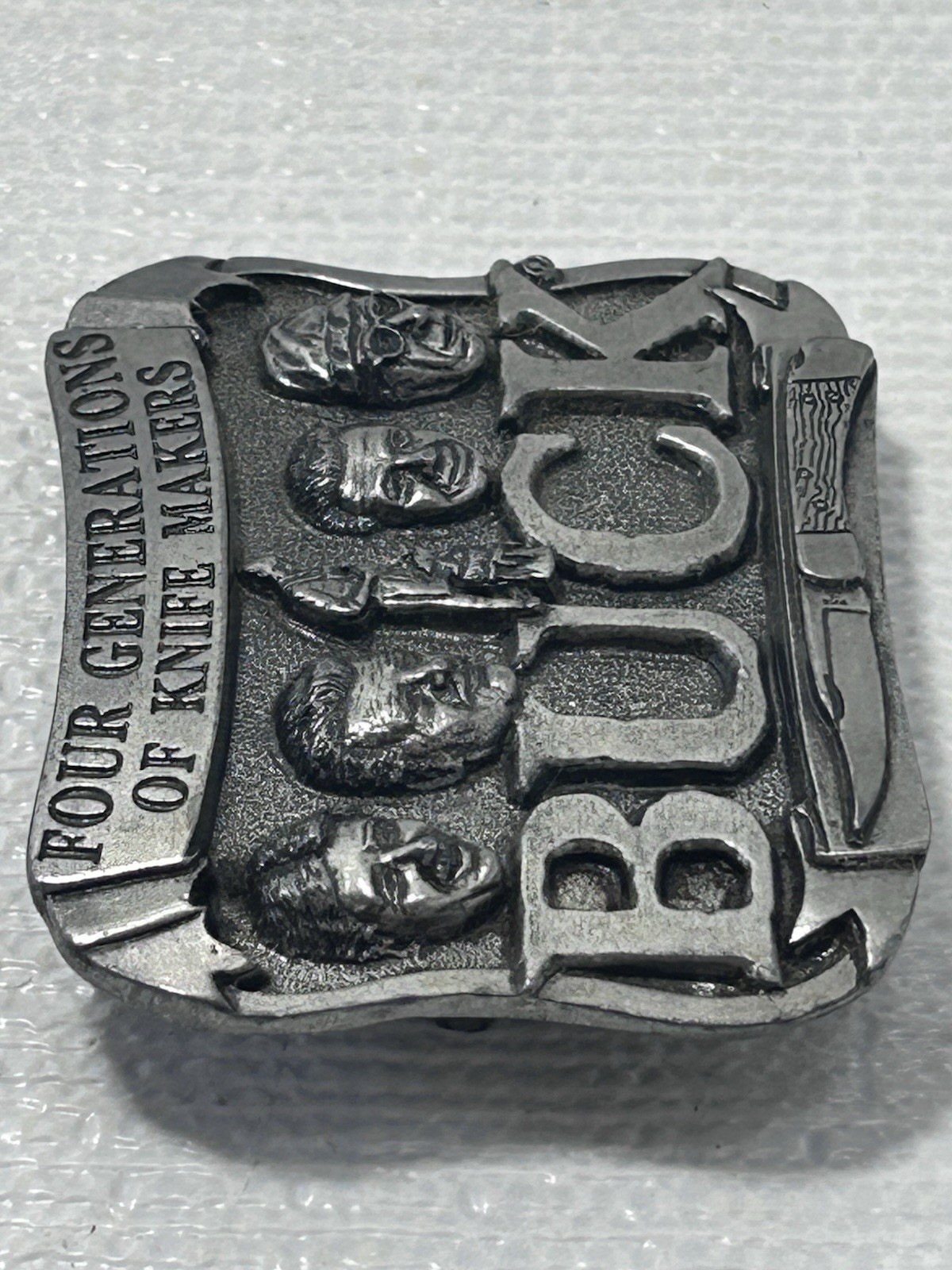 Buck Knives Belt Buckle Four Generations Of Knife Makers Pewter Smoky MT. Knife