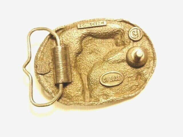 heavy older enameled buckle showing a leaping fish; CJ Inc., 1986, Made in USA