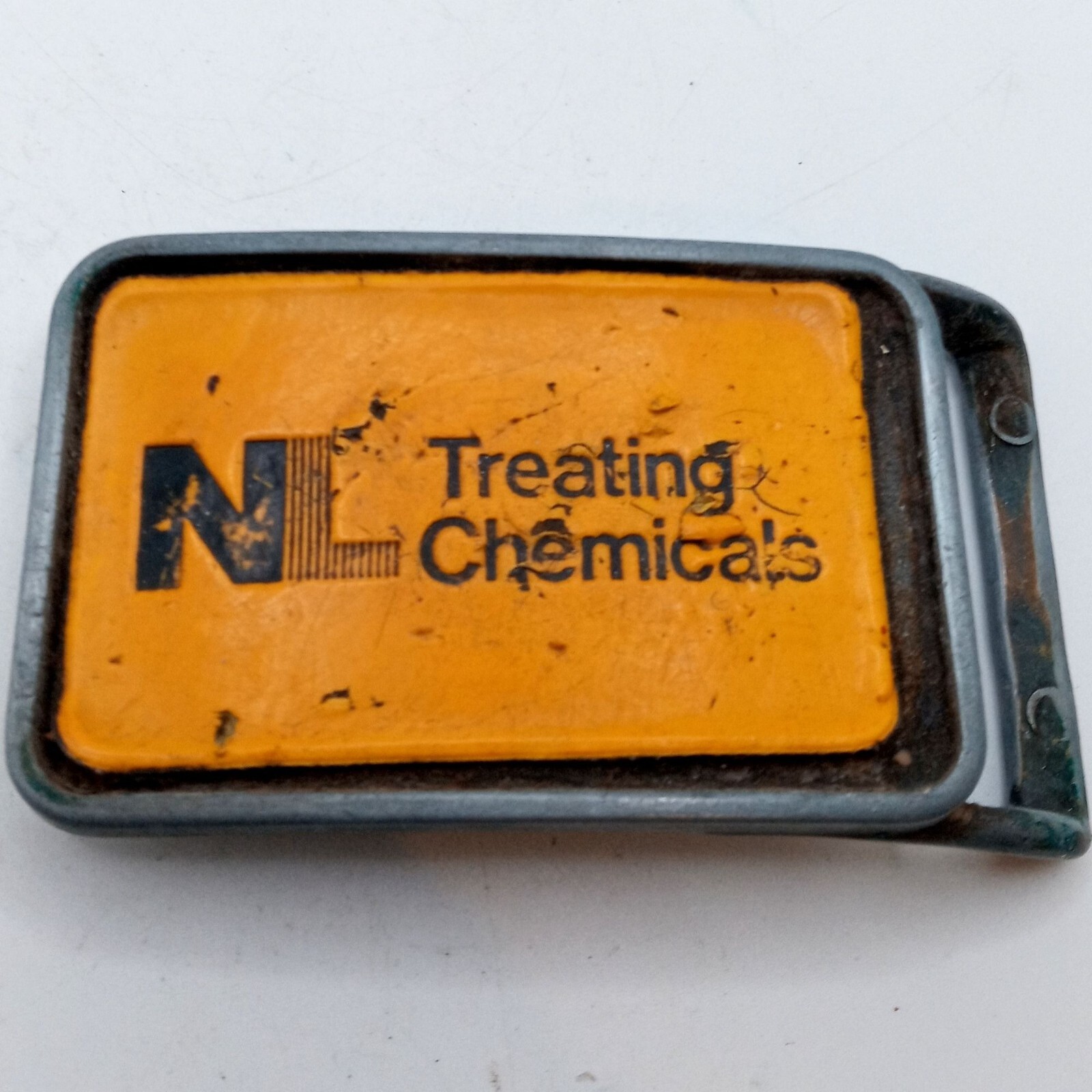 NL Treating Chemicals Belt Buckle Yellow Vintage Distressed Well Worn