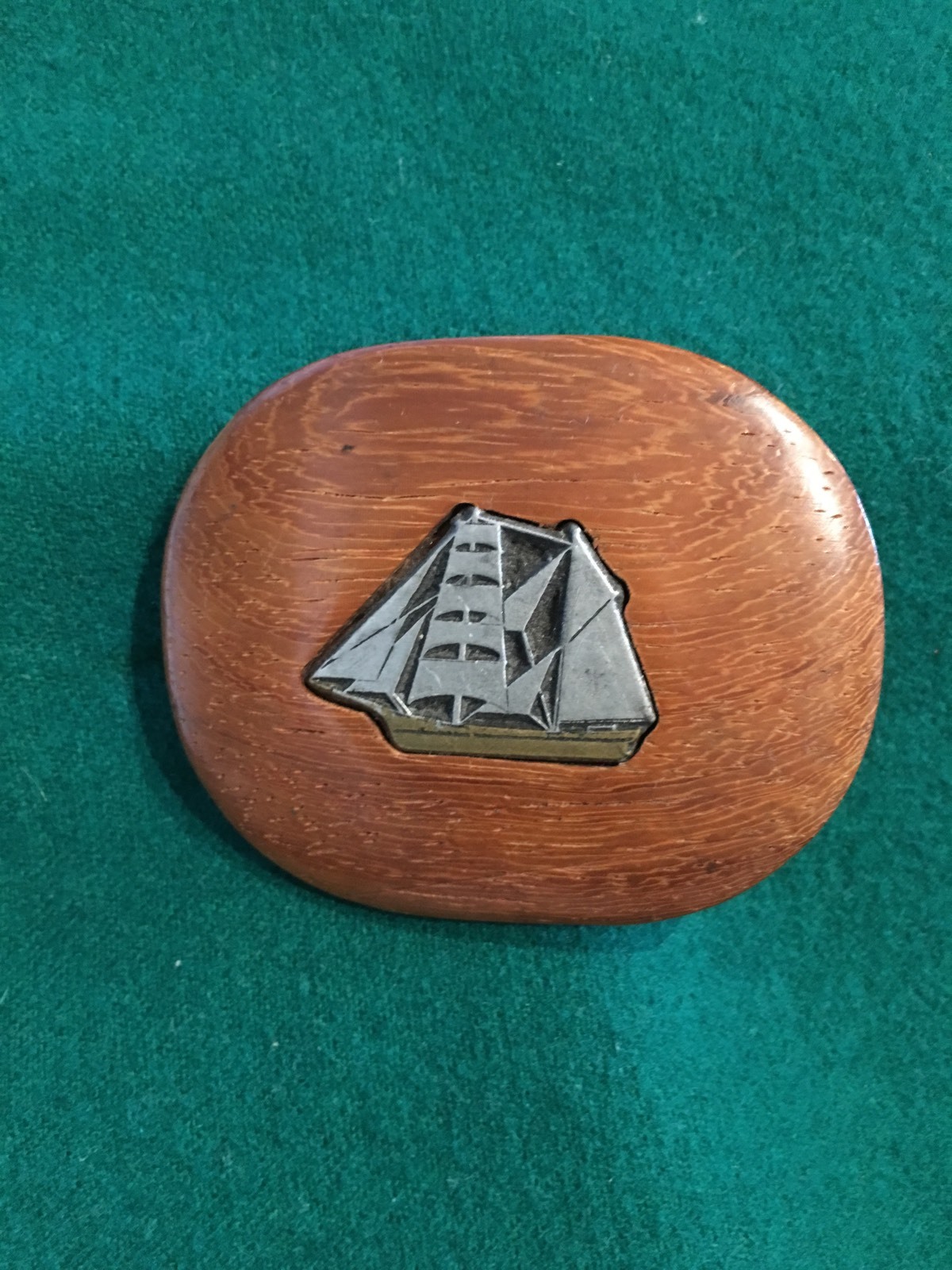 Belt buckle Hand carved wood and pewter inlay of a sailboat
