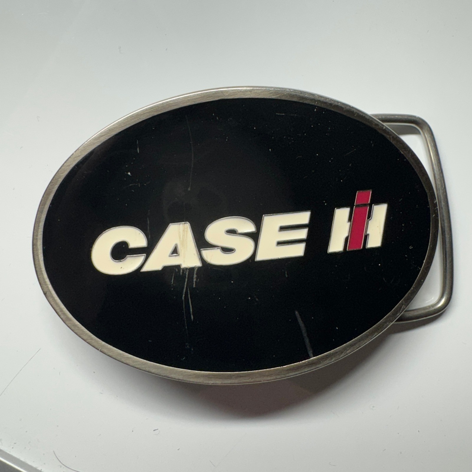 CASE IH Licensed Product Oval Belt Buckle Black Silver Tone CNH America LLC
