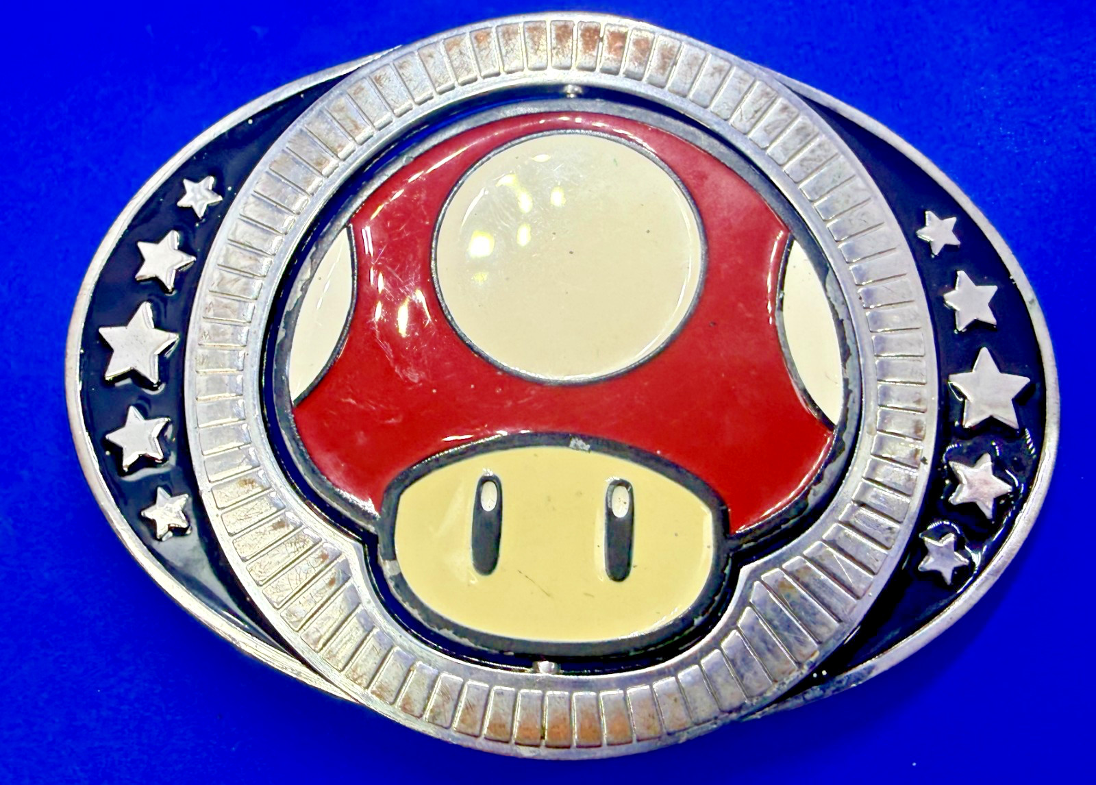 Nintendo Super Mario Bros Game Spinning Mushroom Reversible Novelty Belt Buckle