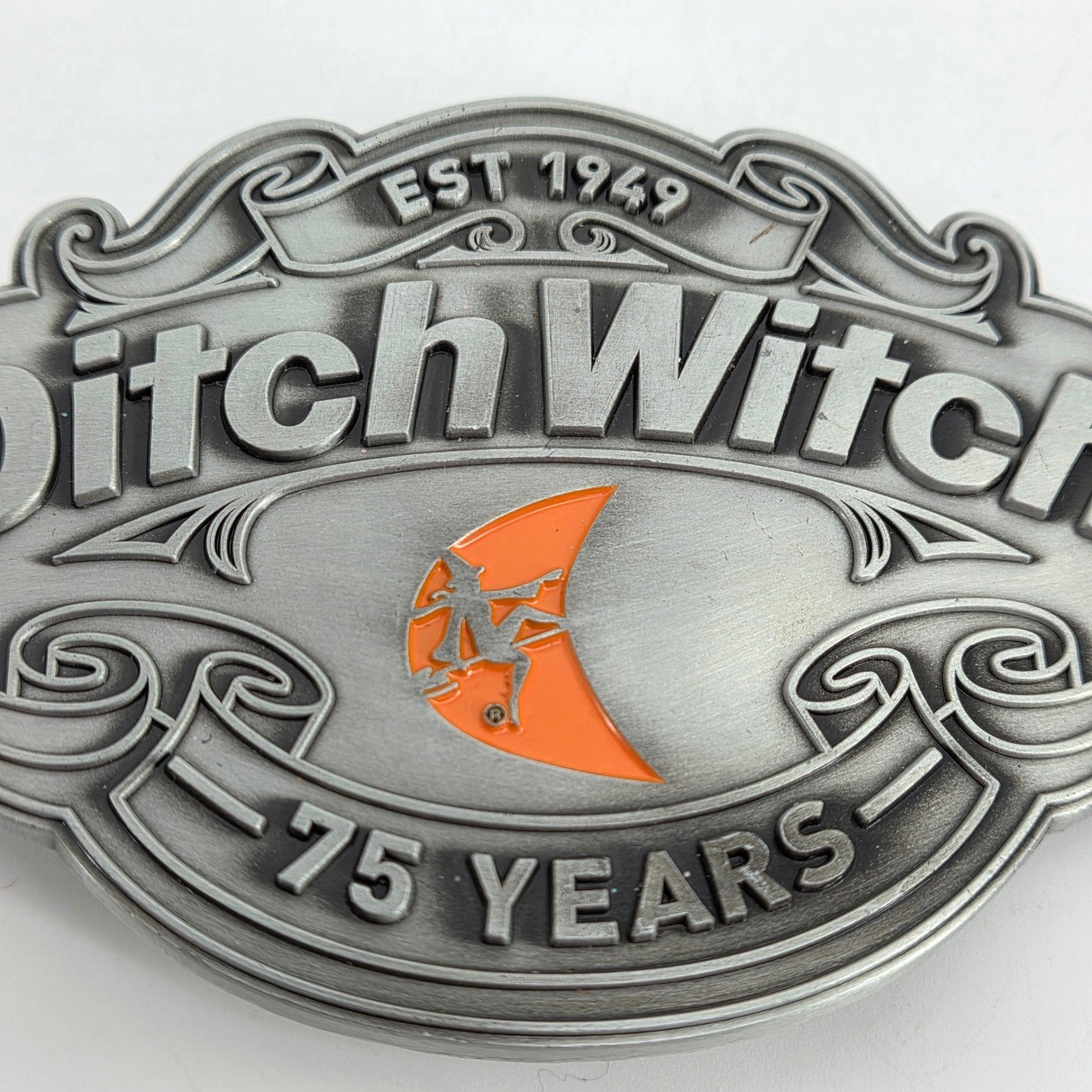 Ditch Witch Construction 75 Year Anniversary Belt Buckle Metal Logo Collectible
