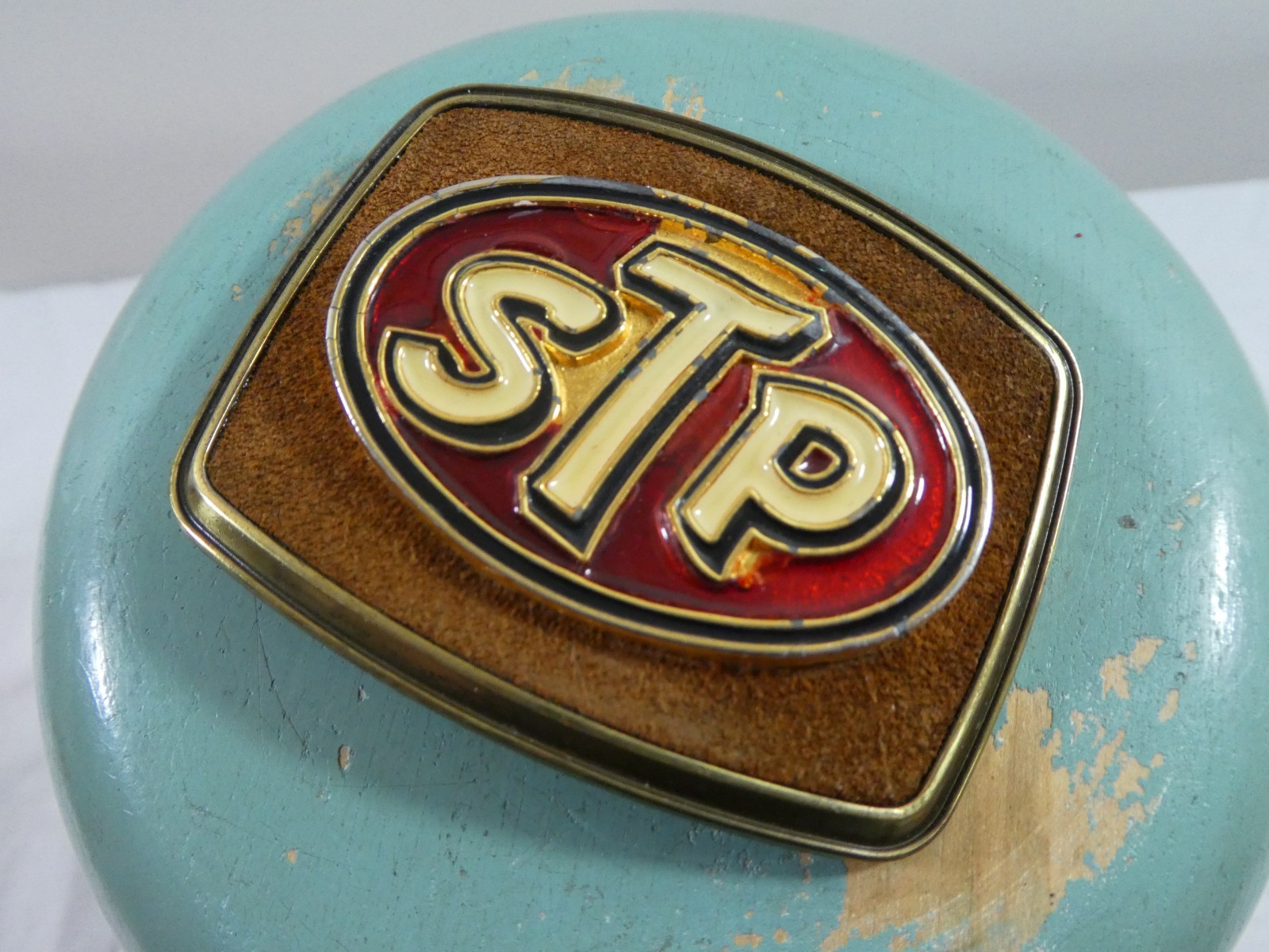 STP Motor Oil Company Belt Buckle 1979 Raintree Enamel Metal Men&rsquo;s Advertisment