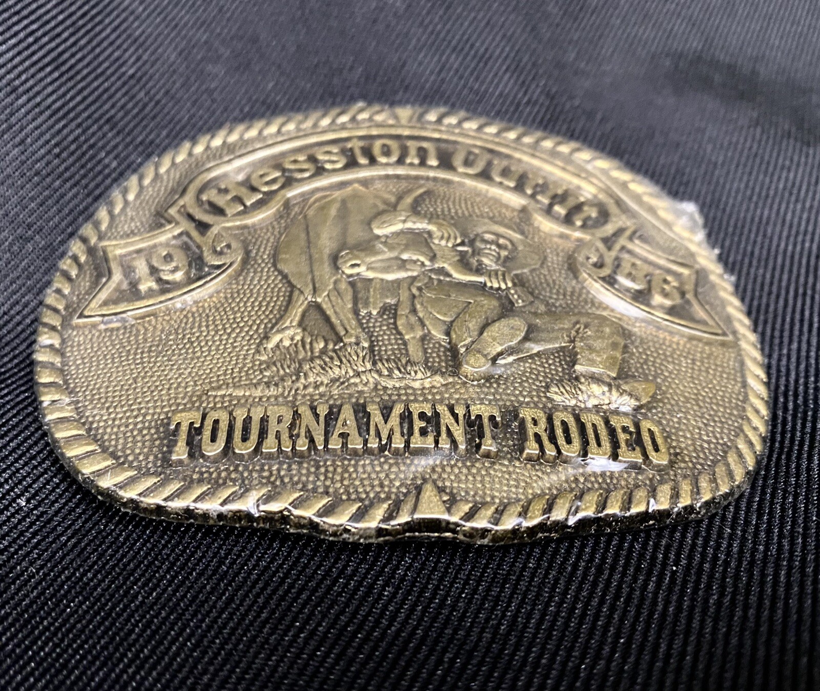 Hesston Belt Buckle 1986 3 3/4” Adult Size Brass Tournament Rodeo *New & Sealed*