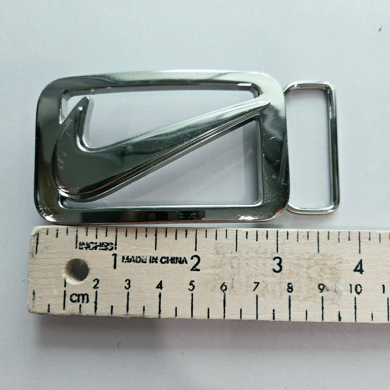 Nike Belt Buckle Silver Swoosh Logo Cutout Metal Streetwear Accessory #1154