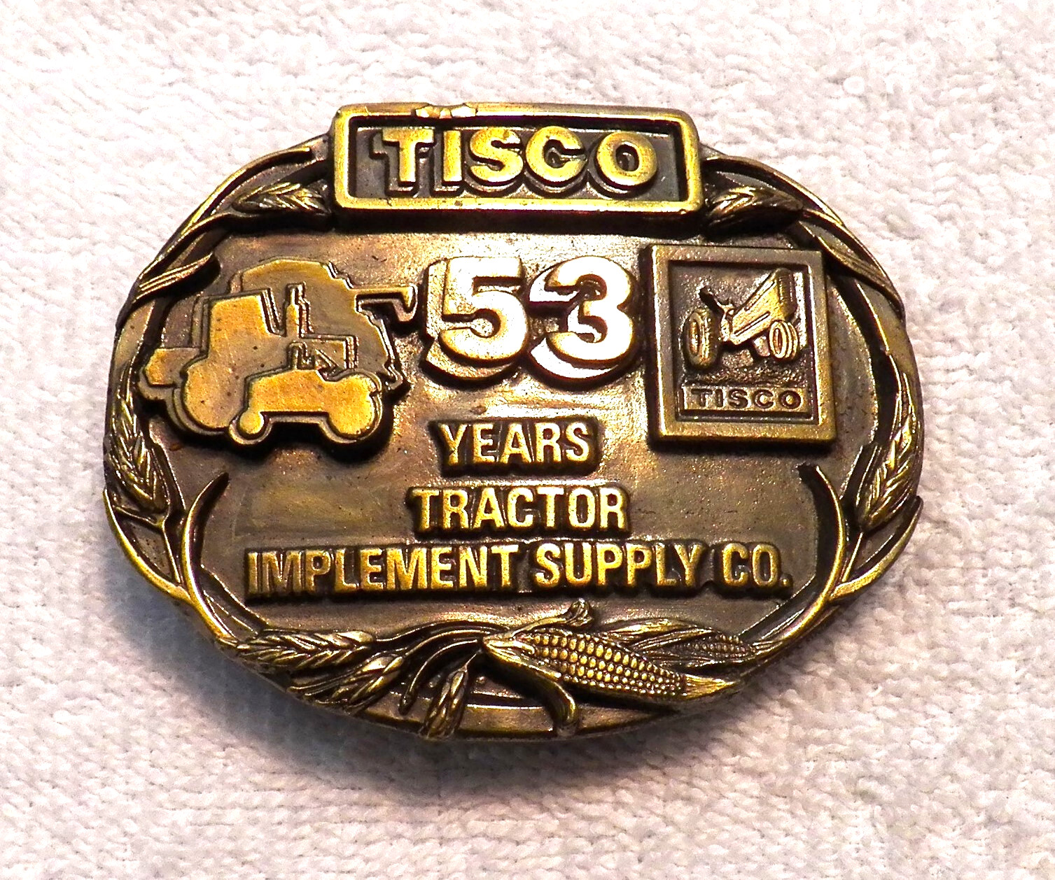 VINTAGE BELT BUCKLE TRACTOR IMPLEMENT SUPPLY (TISCO) SPEC CAST SISKIYOU BB16