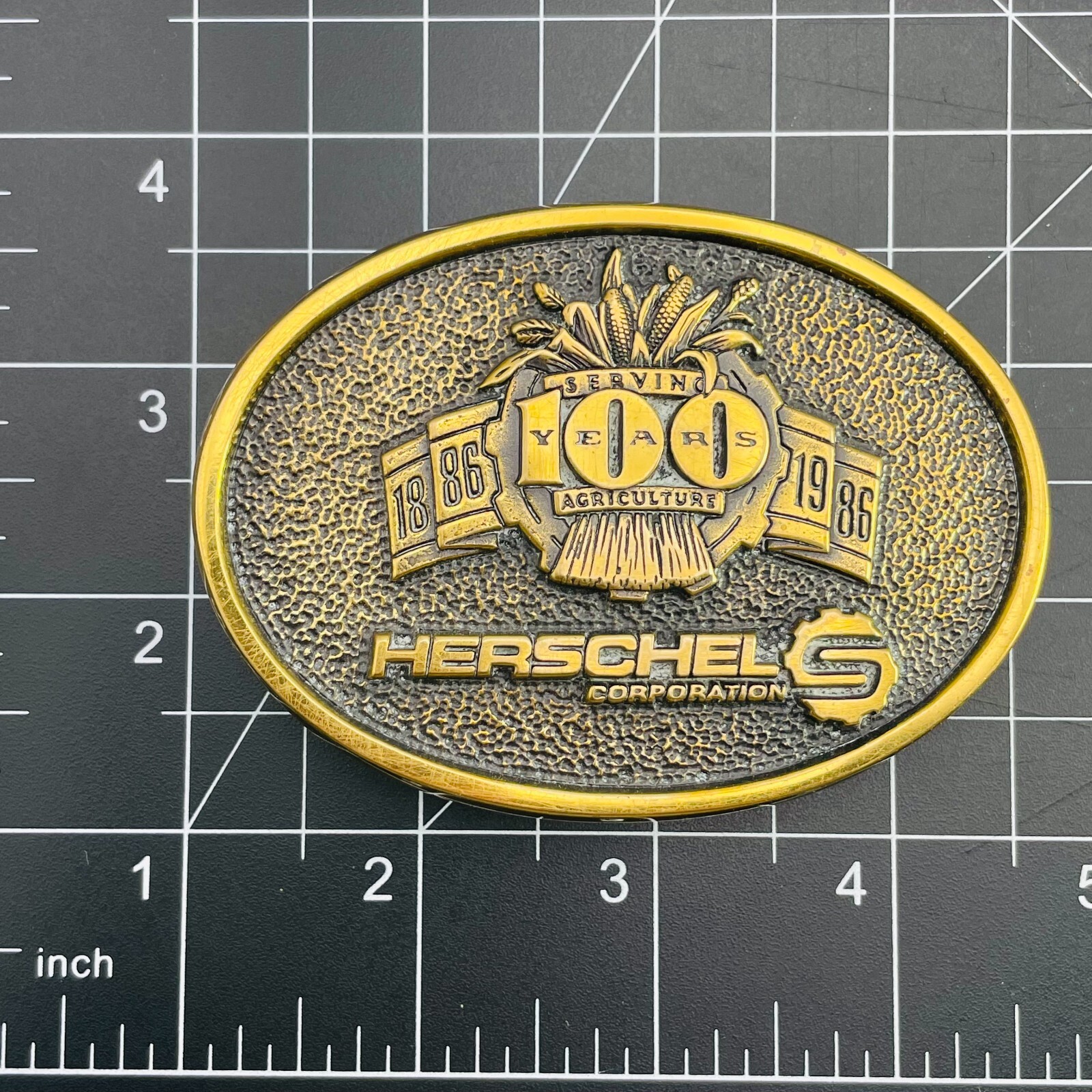 Vintage 1986 Belt Buckle Herschel Corporation 100 Year Agriculture Farming