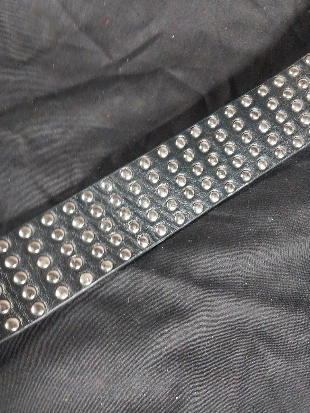 Studded Leather Belt With Skelton Hand Buckle 42&Prime;