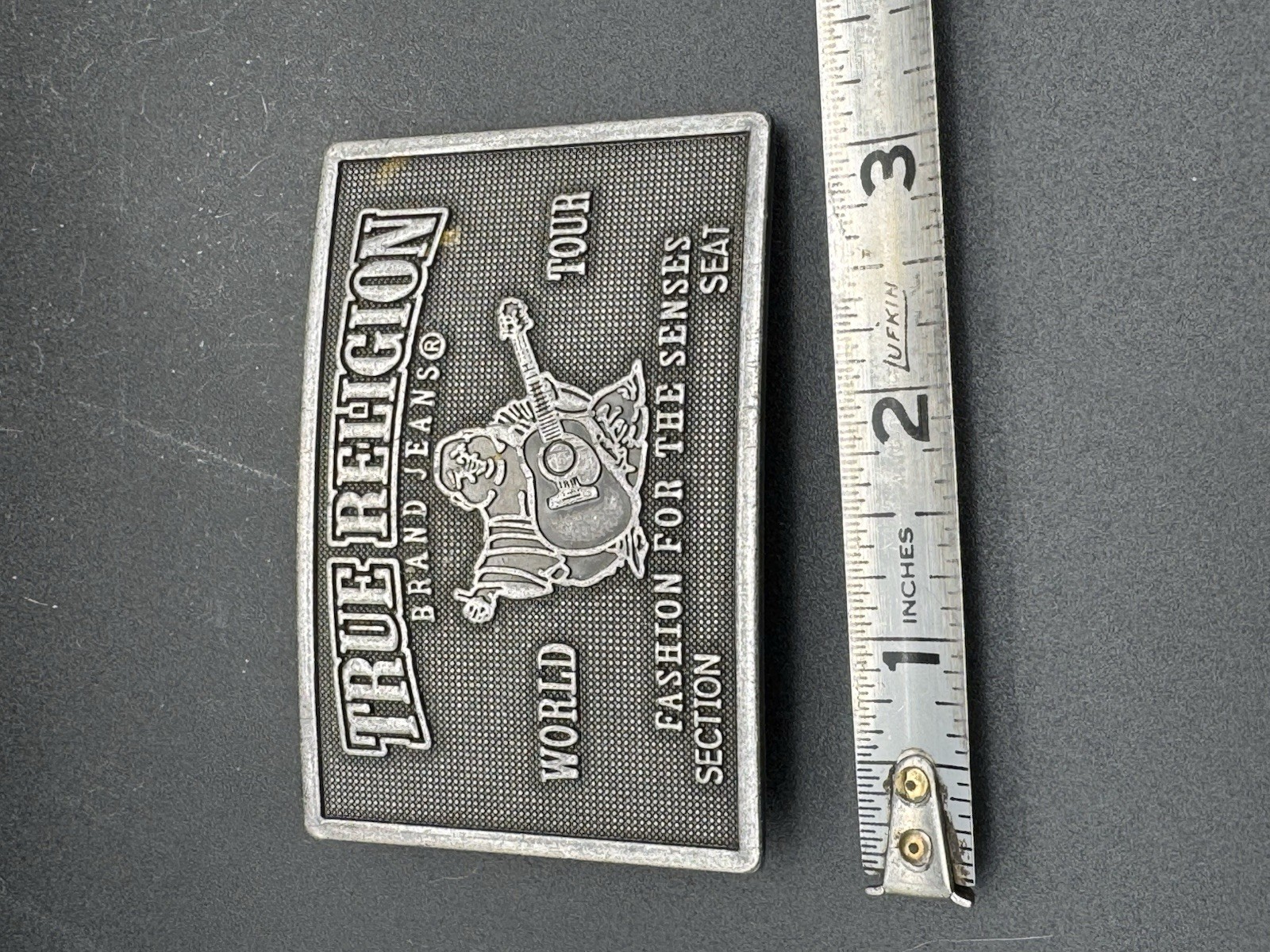 True Religion « World Tour » metal plaque belt buckle