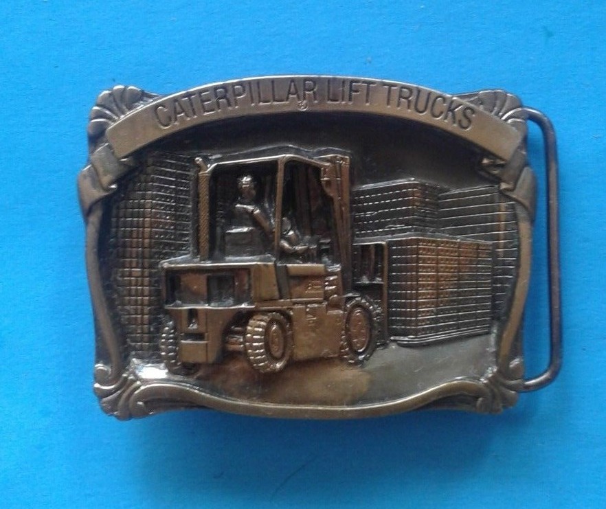 -RARE- Caterpillar Tractor Caterpillar Lift Trucks Vintage Belt Buckle NEW 1988