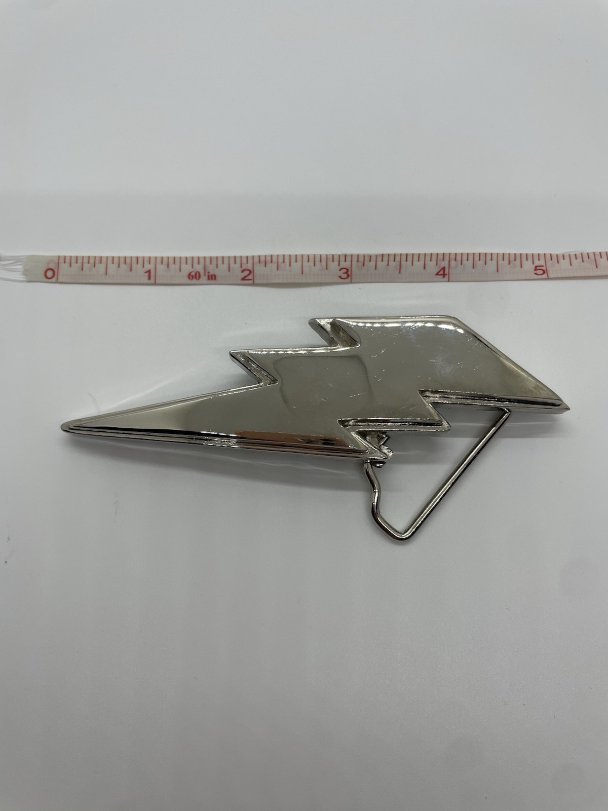 Buckle-Back Silver Lightning Bolt Western Metal Belt Buckle 5 in long.