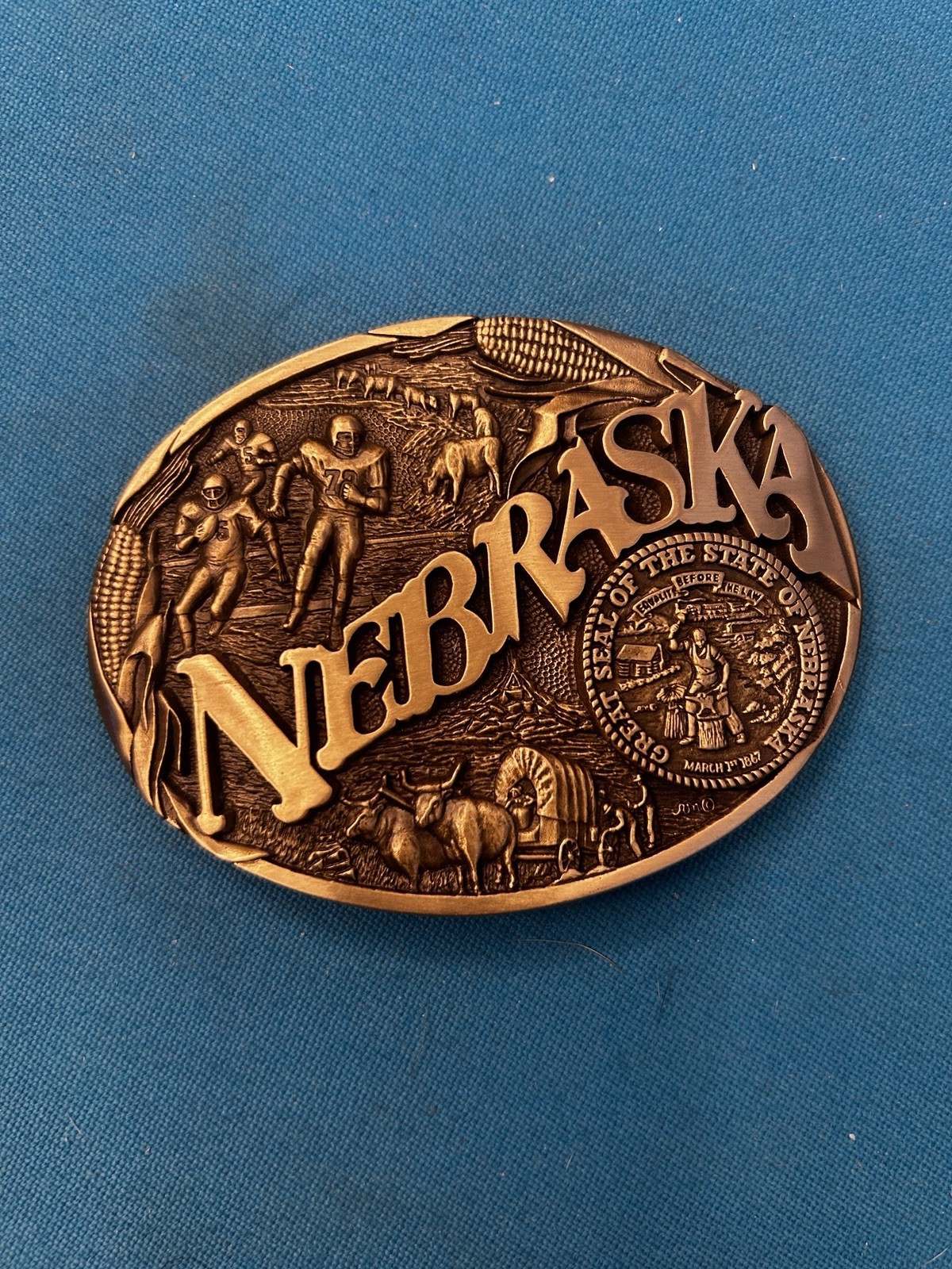 Silver Metal Embossed Plate Belt Buckle – Nebraska USA Football