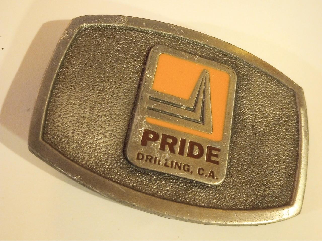 Vintage Pride Drilling C.A. Belt Buckle Brass with Orange Enamel Arizona Based?