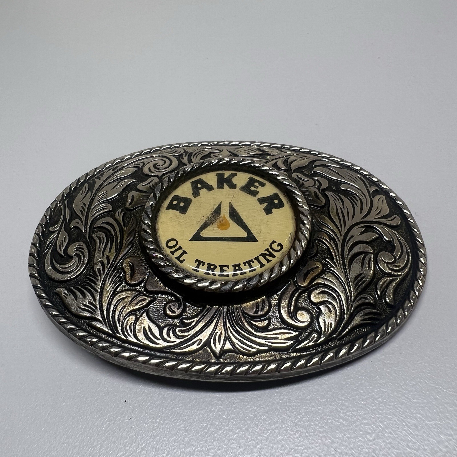 Baker Oil Treating Belt Buckle Vintage Western Floral Oval Silver Tone