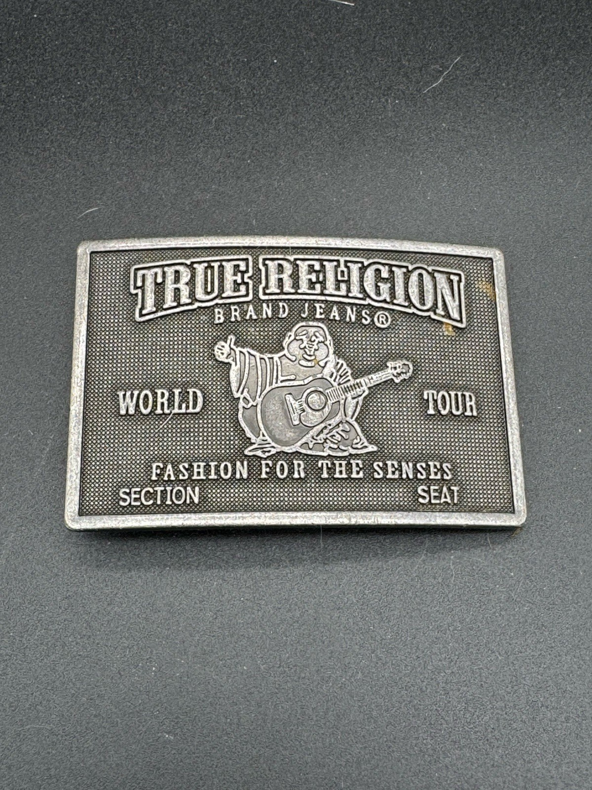 True Religion « World Tour » metal plaque belt buckle