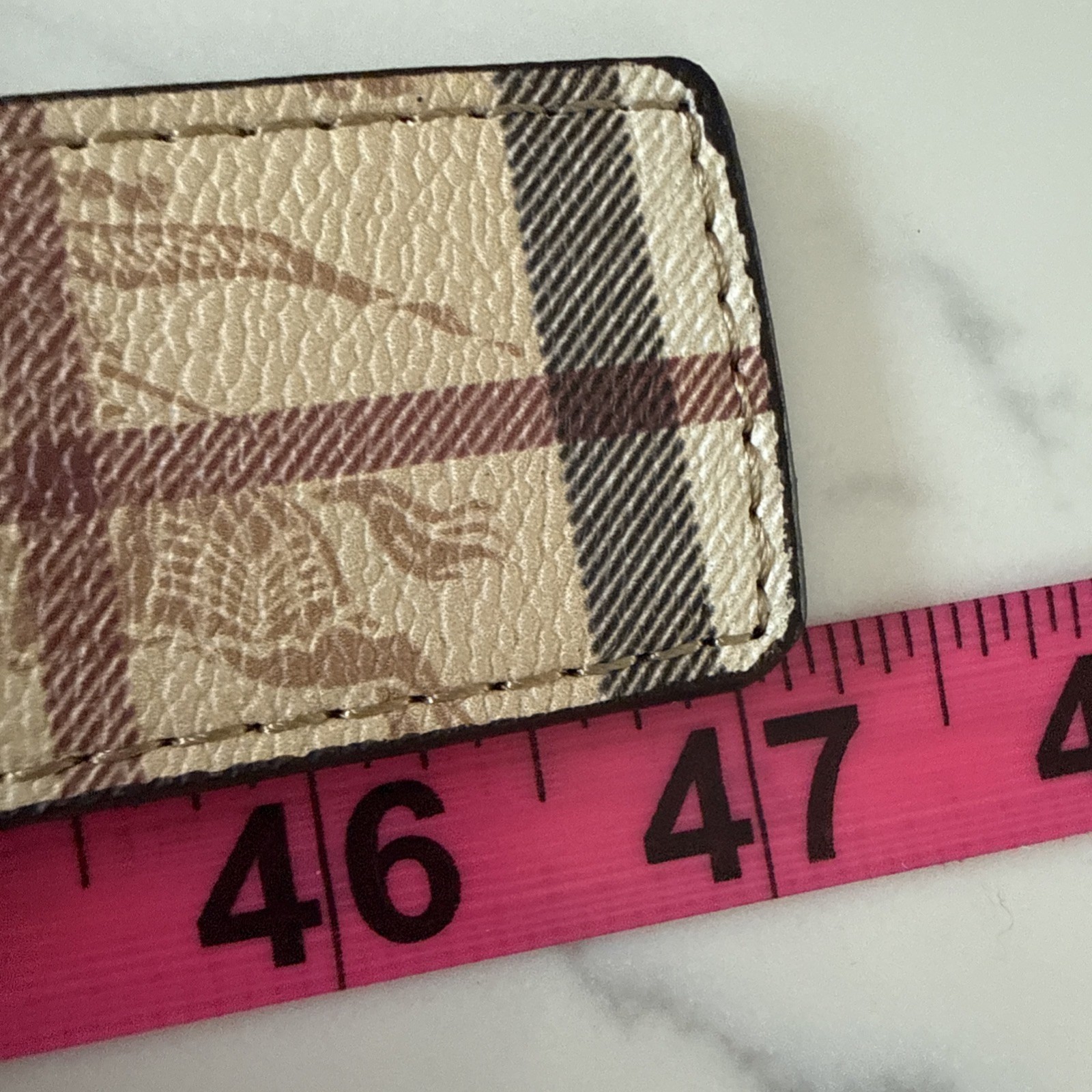 Burberry reversible belt in sand tone. polished metal buckle