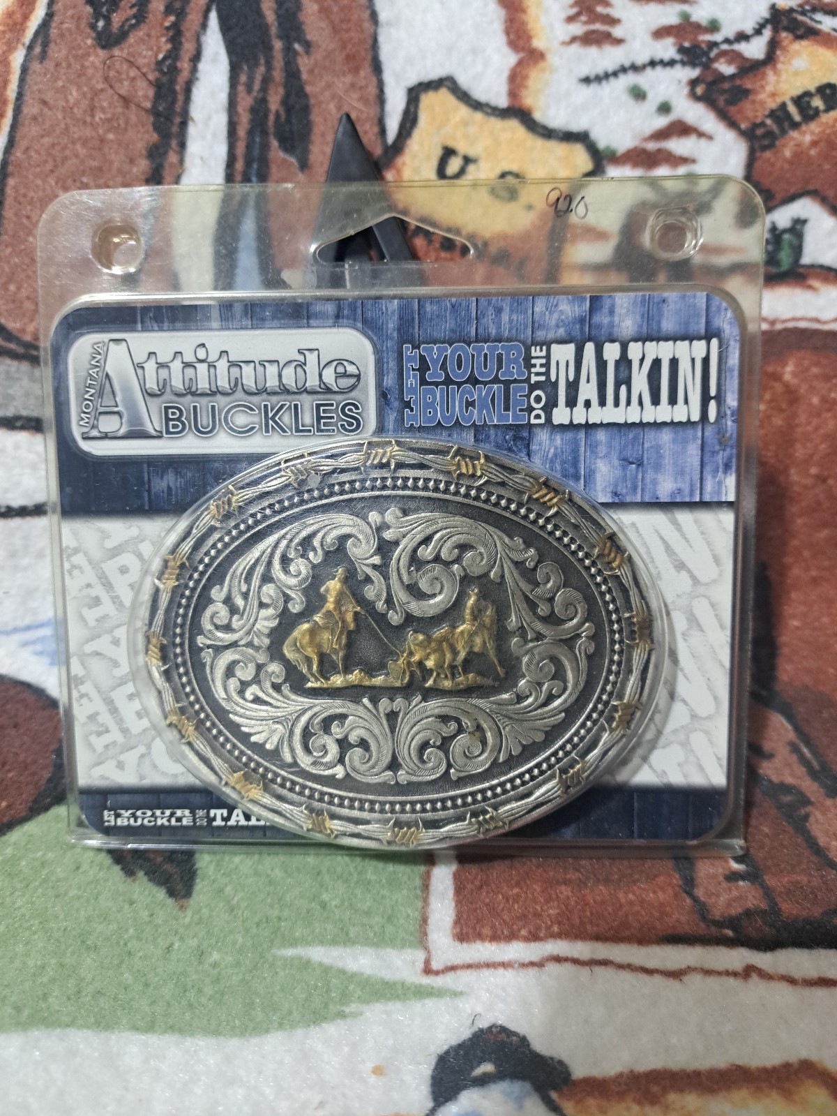 Attitude, Gold and silver tone over zinc alloy team roper buckle