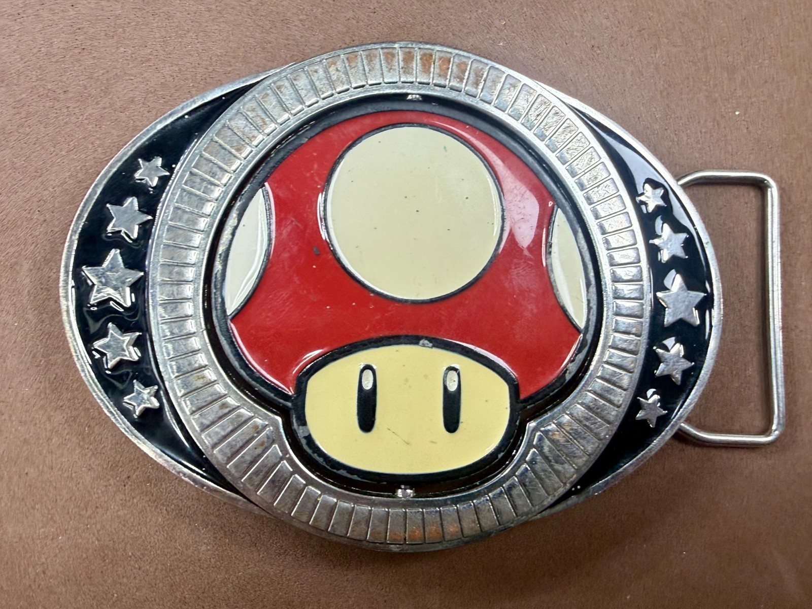 Nintendo Super Mario Bros Game Spinning Mushroom Reversible Novelty Belt Buckle