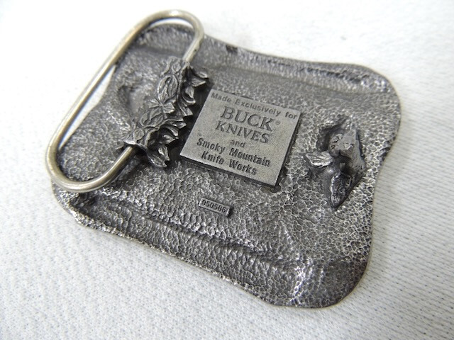 Vintage 1980’s Buck Knives Smokey Mountain Knife Works Belt Buckle