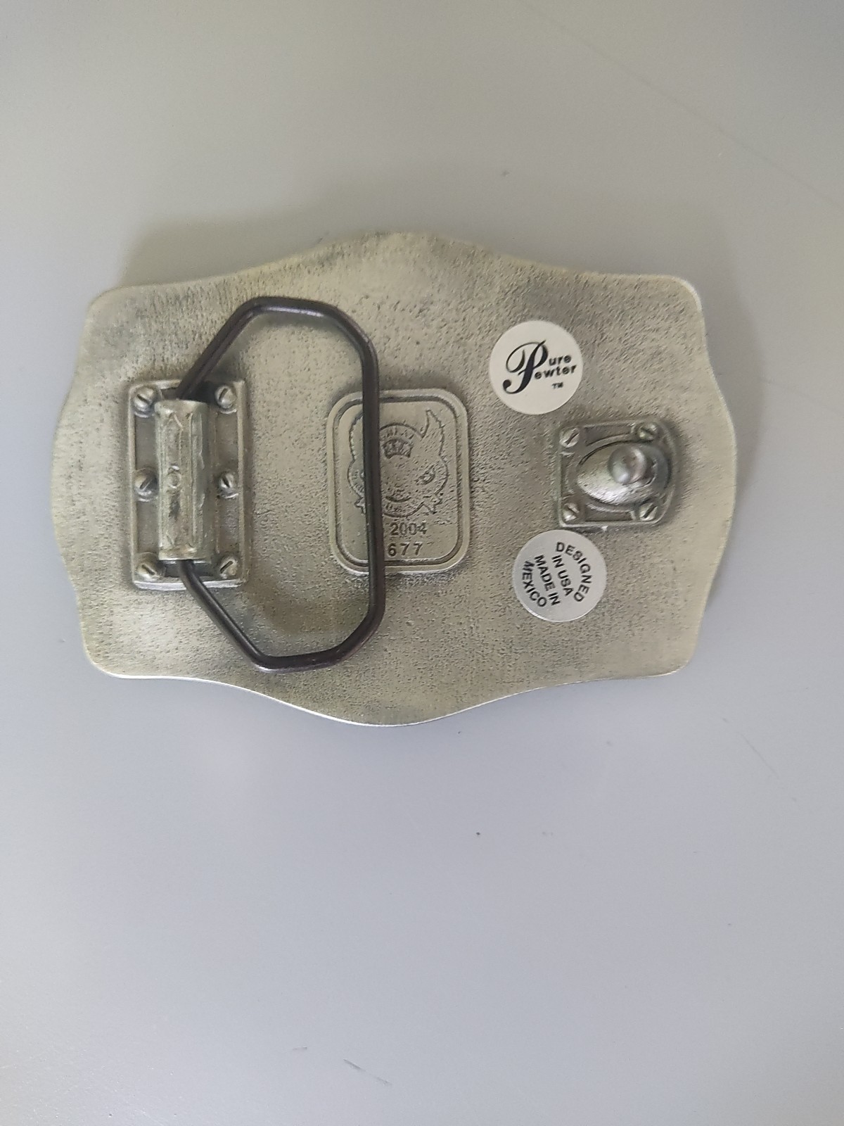 New Belt Buckle Featuring a Surfer