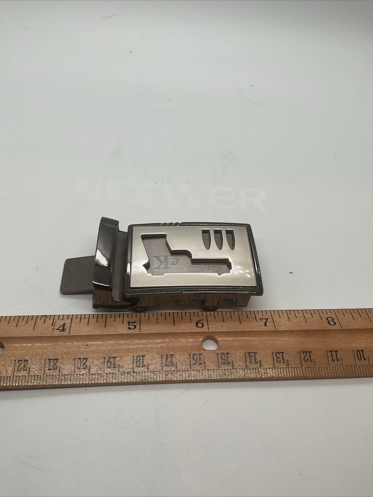 CALVIN KLEIN – Metal Belt Buckle With Gun Cutout – Black & Silver