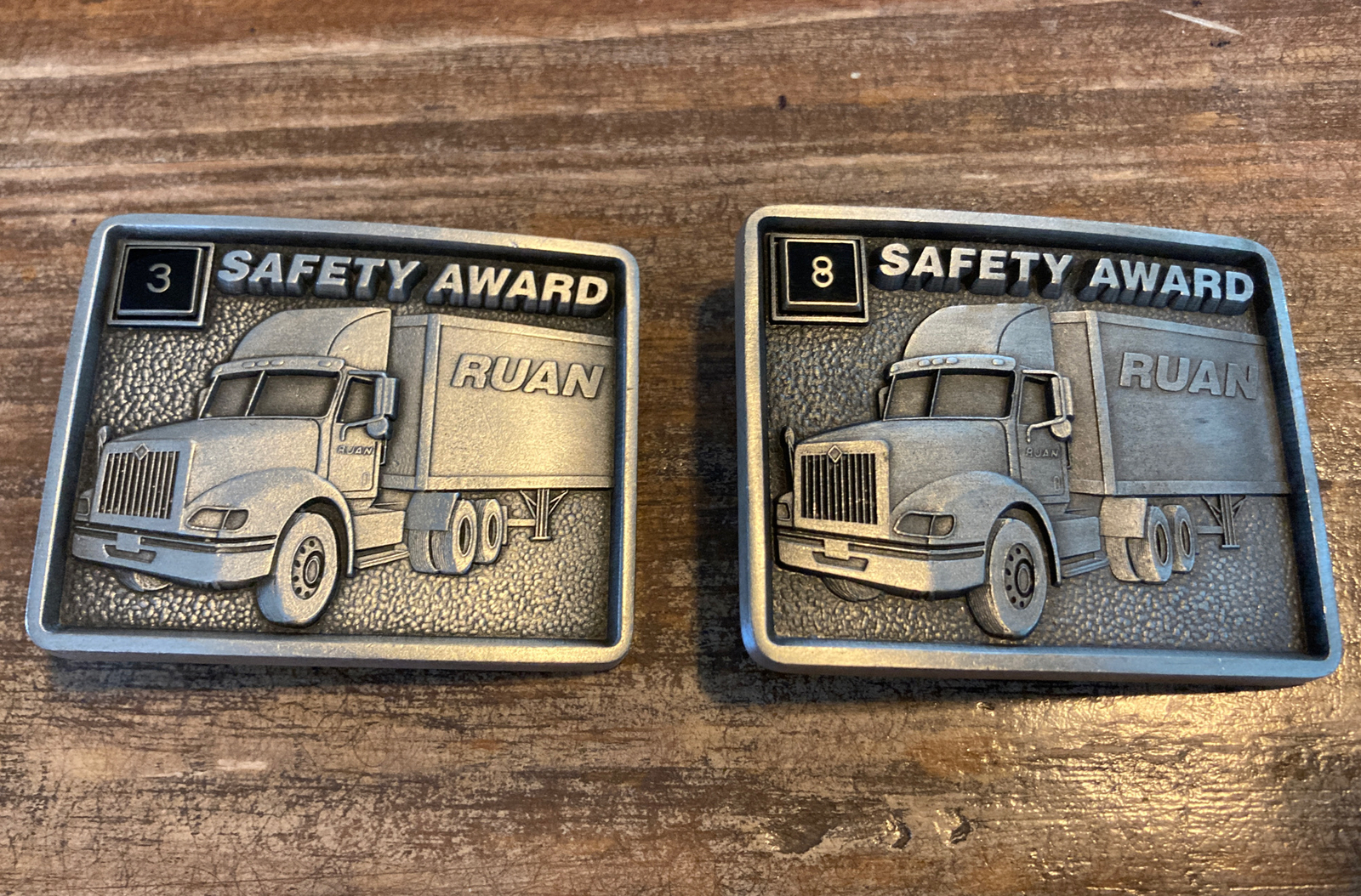 2 Vtg Ruan Semi Trucking Pewter Belt Buckle Made in USA 3 & 8 Year Safety Award