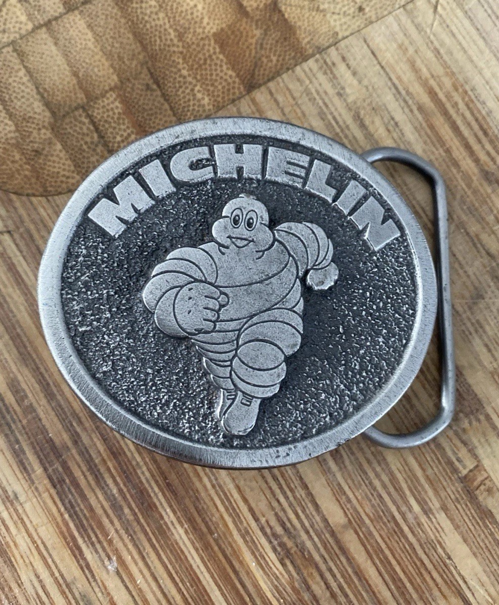 VINTAGE 80’s Michelin Man Tire Belt Buckle Made In USA, Great American Buckle Co