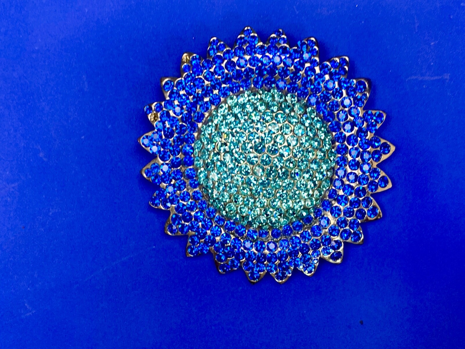 A Blue Green Sea Of Rhinestones – Starburst Cutout Vintage Belt Buckle