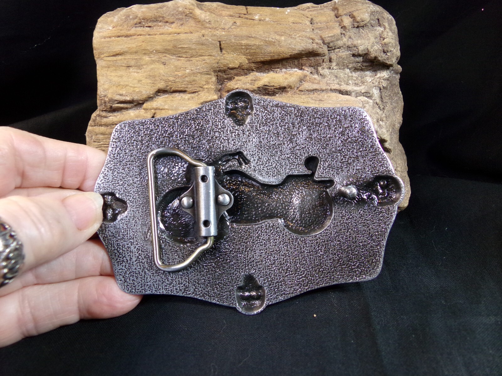 Motorcycle Belt Buckle with the American Flag & 4 Skulls in the middle & ends.