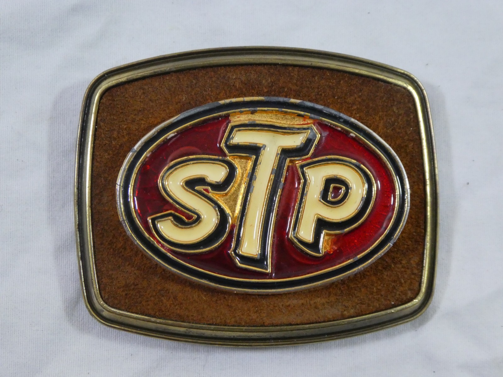 STP Motor Oil Company Belt Buckle 1979 Raintree Enamel Metal Men&rsquo;s Advertisment