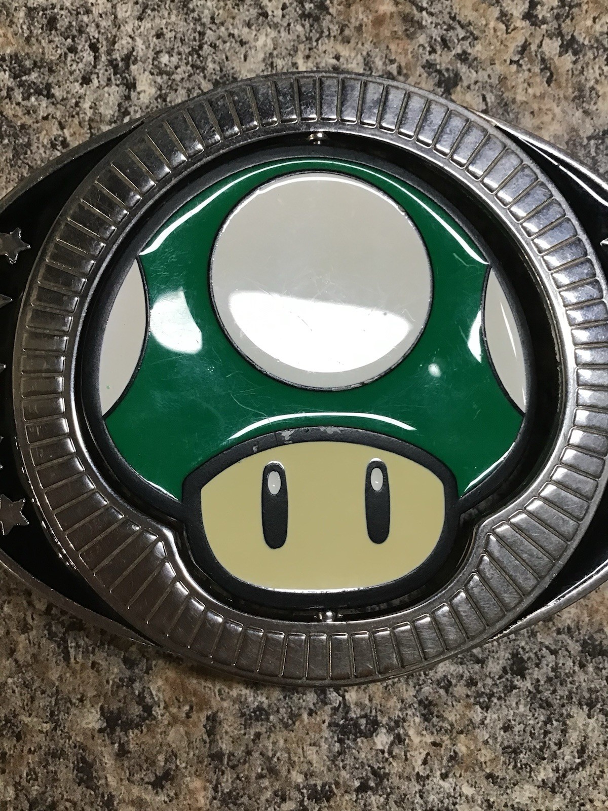 2011 Nintendo Super Mario Brothers reversible red green mushroom belt buckle