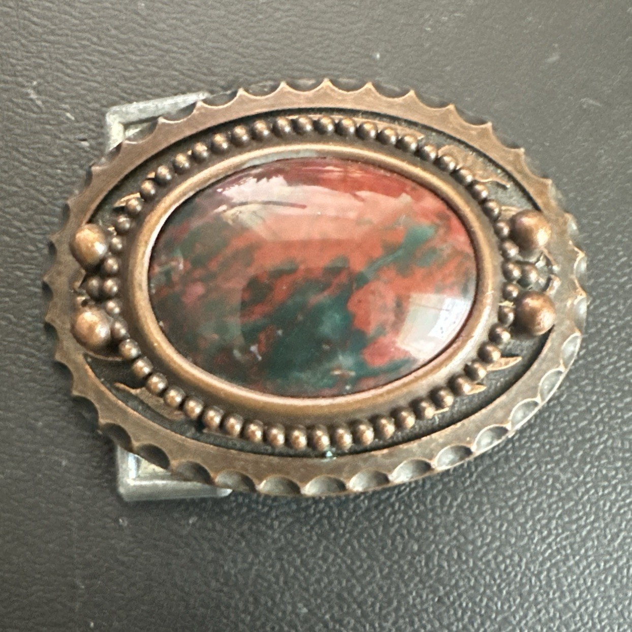 vtg ornate oval belt buckle With polished red & Green Center stone Agate?