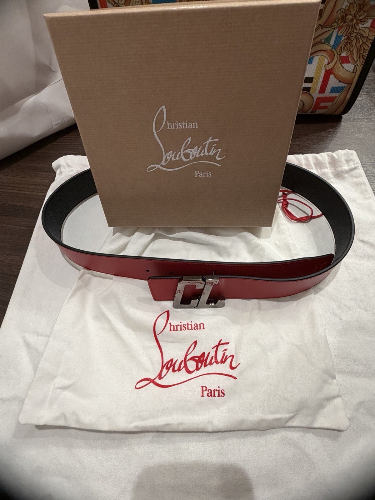 NEW CHRISTIAN LOUBOUTIN RED/ BLACK REVERSIBLE BELT. WITH BOX DUST BAG TAGS