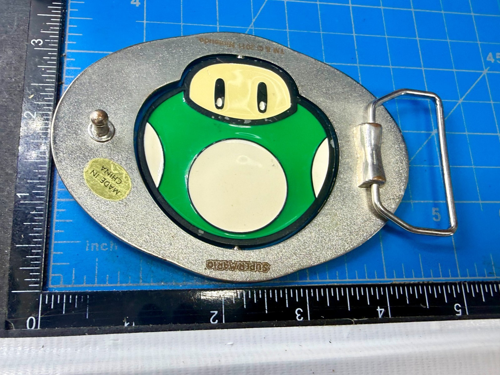 Nintendo Super Mario Bros Game Spinning Mushroom Reversible Novelty Belt Buckle