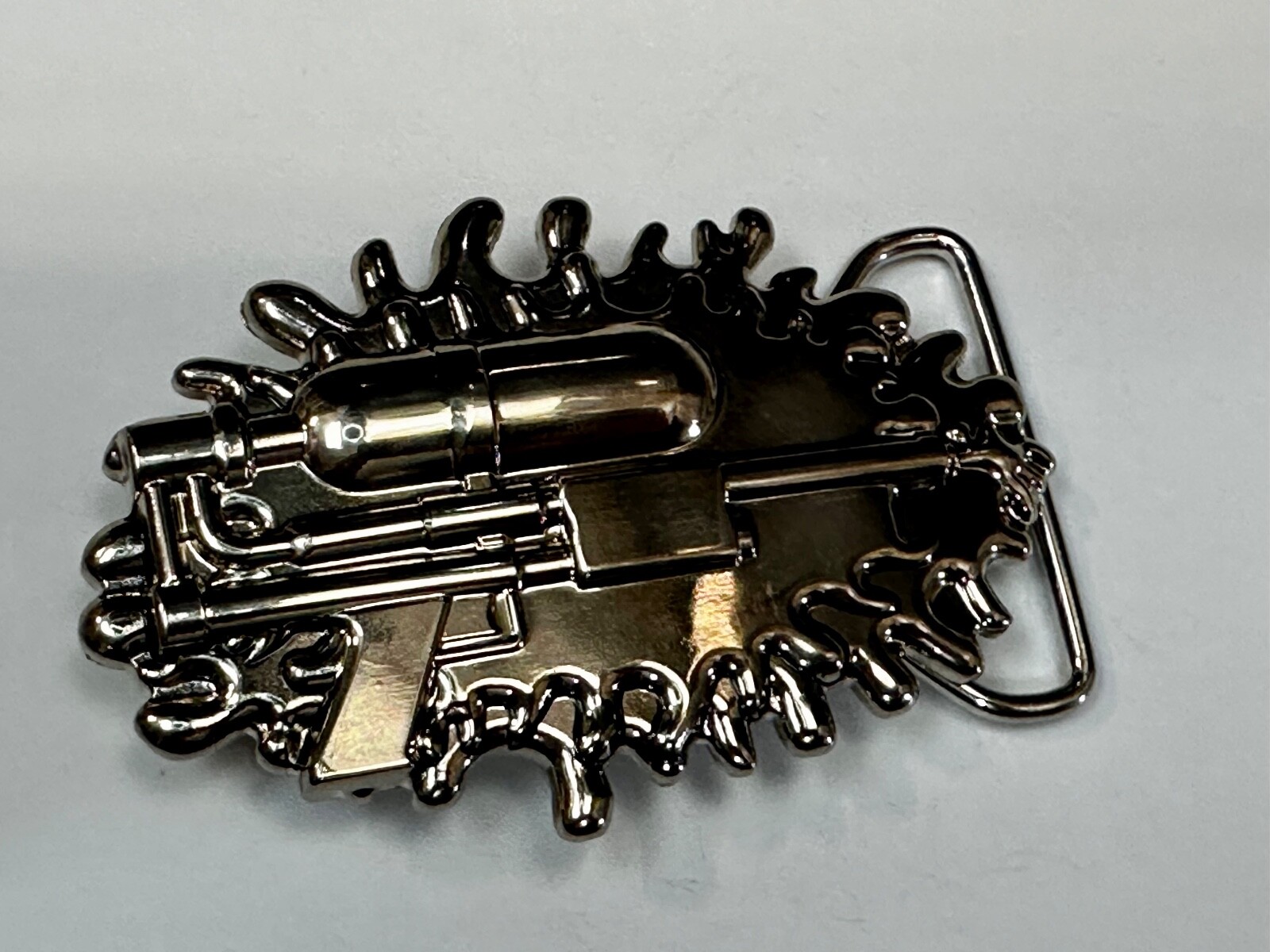 Water Squirt Gun – Alien Martian Shooter! Silver color 2005 SMC Gun Belt Buckle