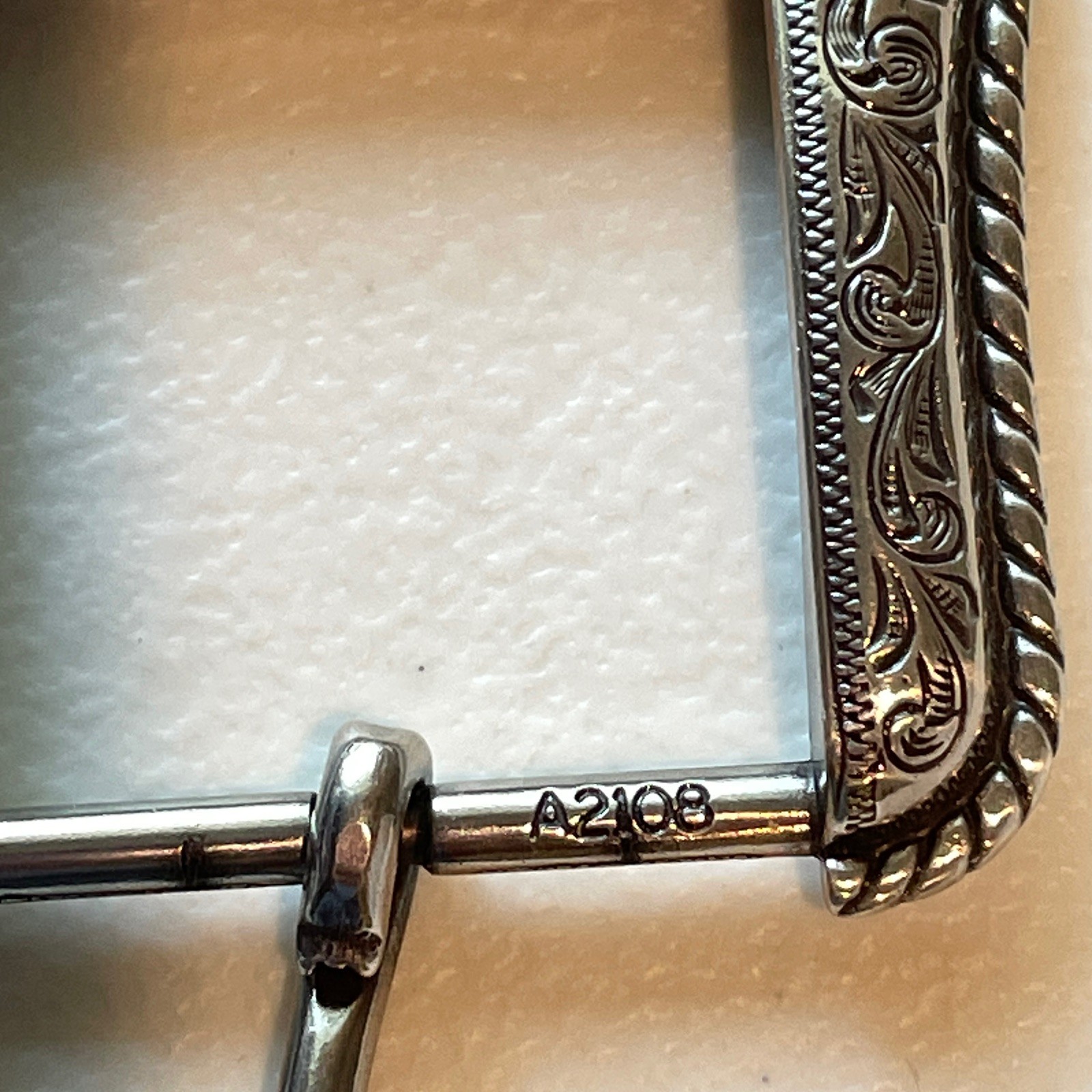 Ariat Western Belt Buckle Filigree Scroll Logo Silver Toned Rope Edge A2108
