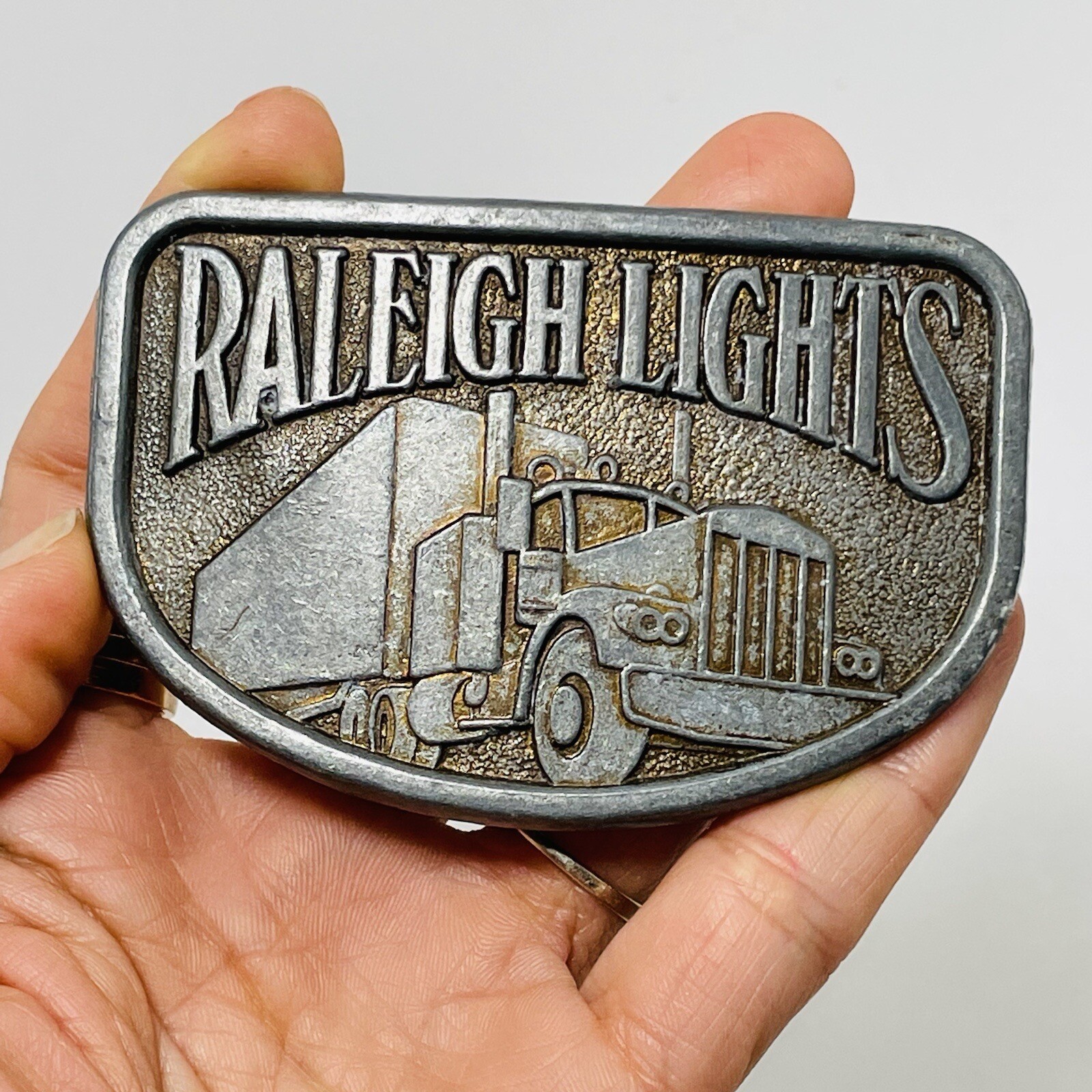 Vintage Raleigh Lights Belt Buckle Men Truck Semi Vehicle Transportation Silver