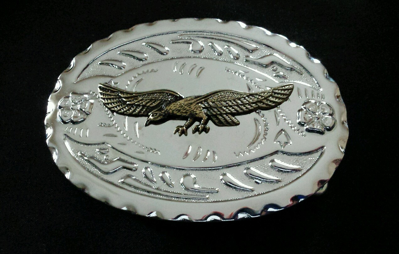 SPREAD WING BRASS TONED EAGLE WESTERN BELT BUCKLE SILVER TONED BACKGROUND