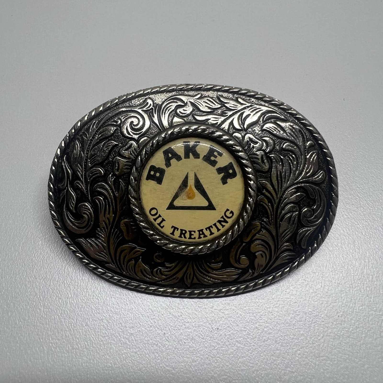 Baker Oil Treating Belt Buckle Vintage Western Floral Oval Silver Tone