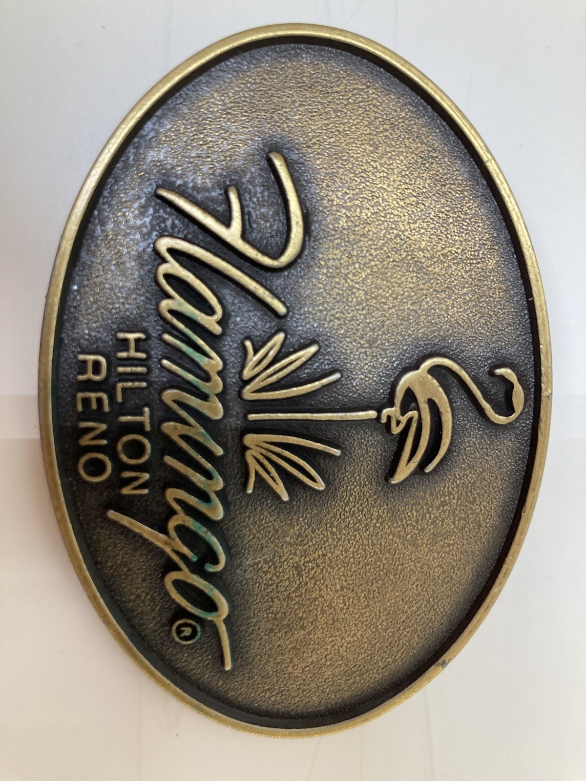 Brass Colored Metal “Flamingo” Hilton Reno 3” Belt Buckle